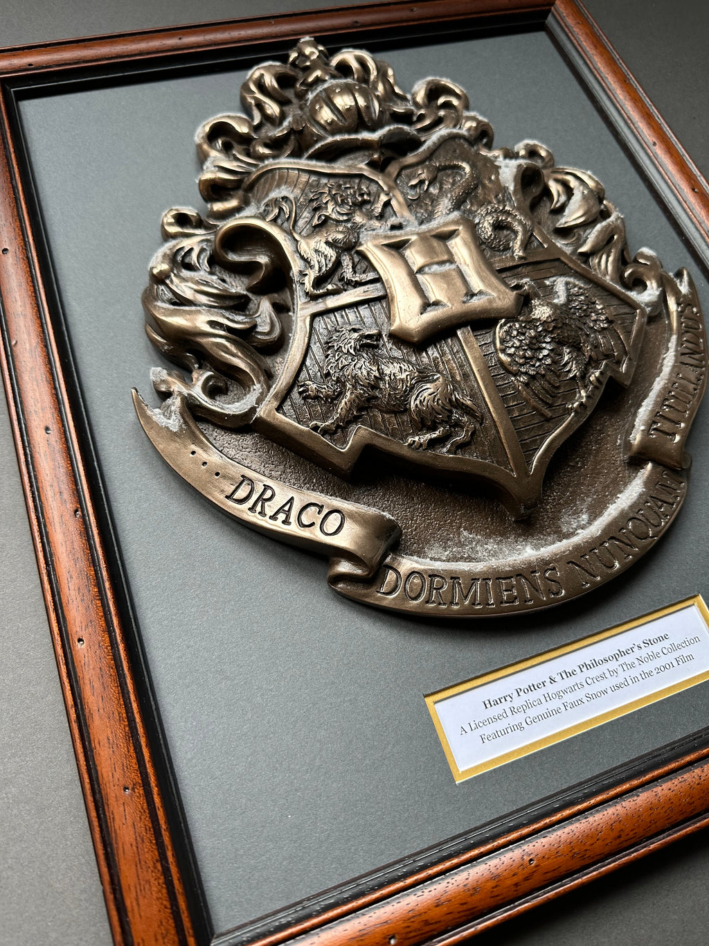 Harry Potter & The Philosopher’s Stone (2001) - A Replica Crest Display Featuring Faux Snow used in the Film